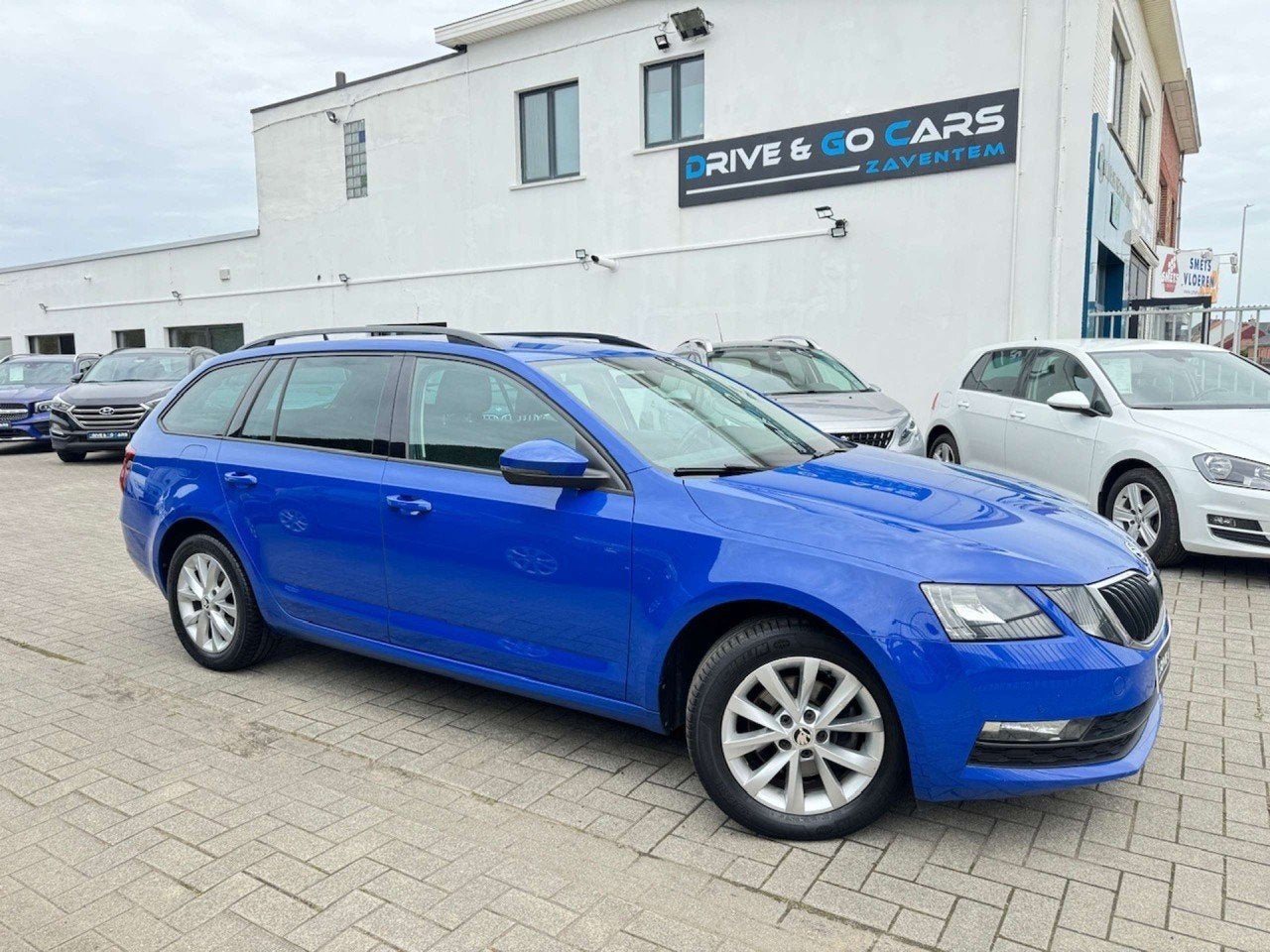 Skoda Octavia SW 1.5 TSI ACT Style DSG Automaat CarPlay, Stof, 4 cilinders, Blauw, Bedrijf