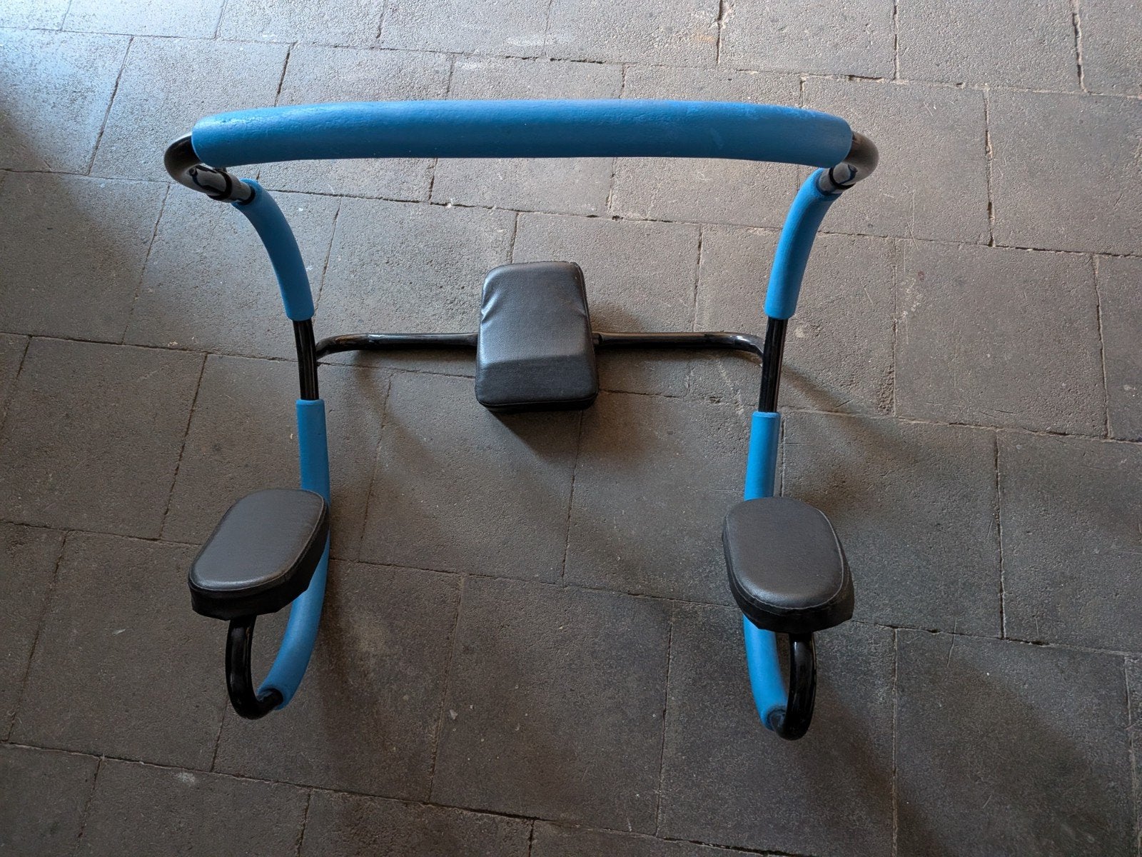 buikspiertrainer, Ophalen