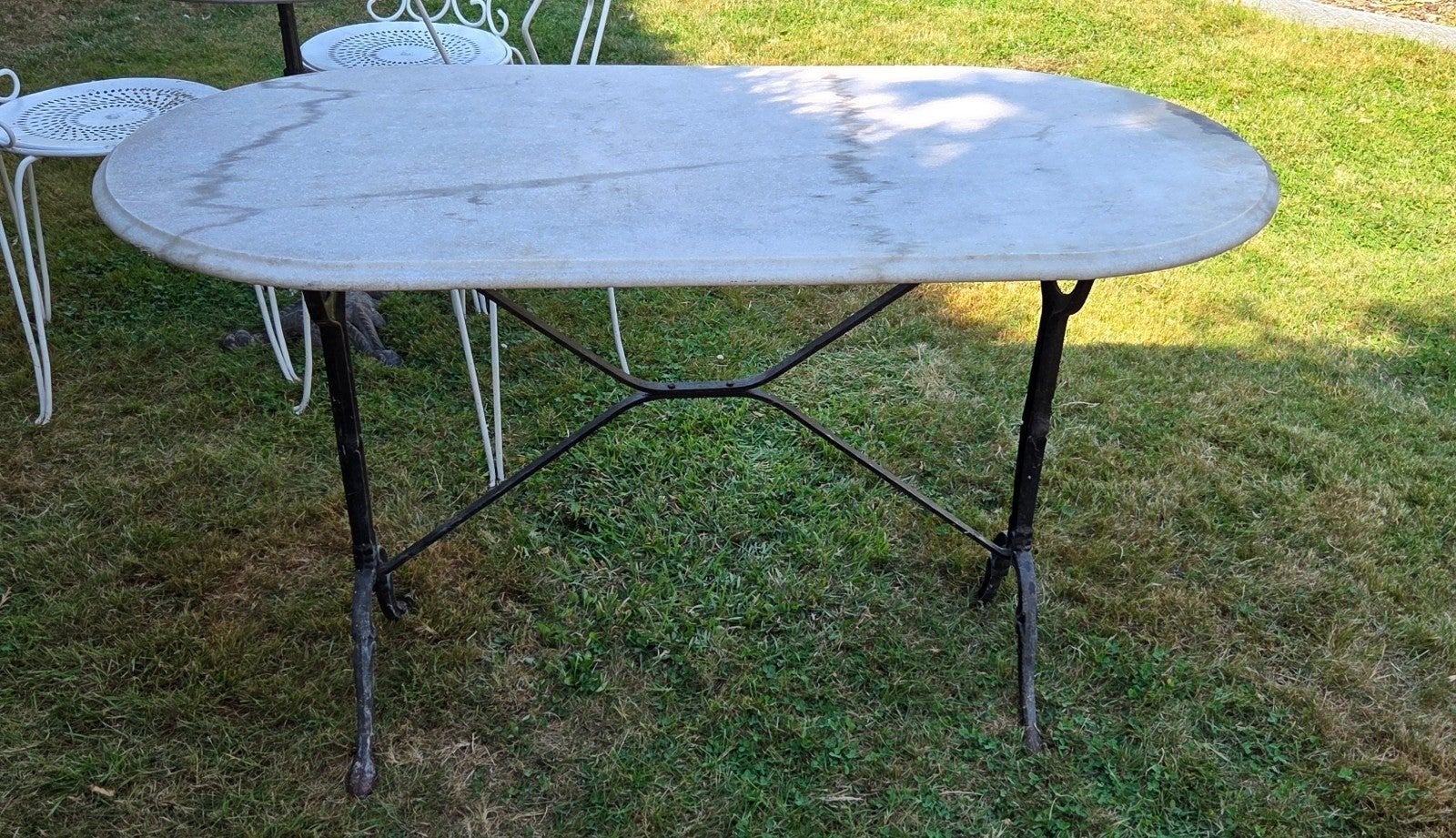 table ovale  en travertin pieds en fer forgé, Enlèvement, Ovale