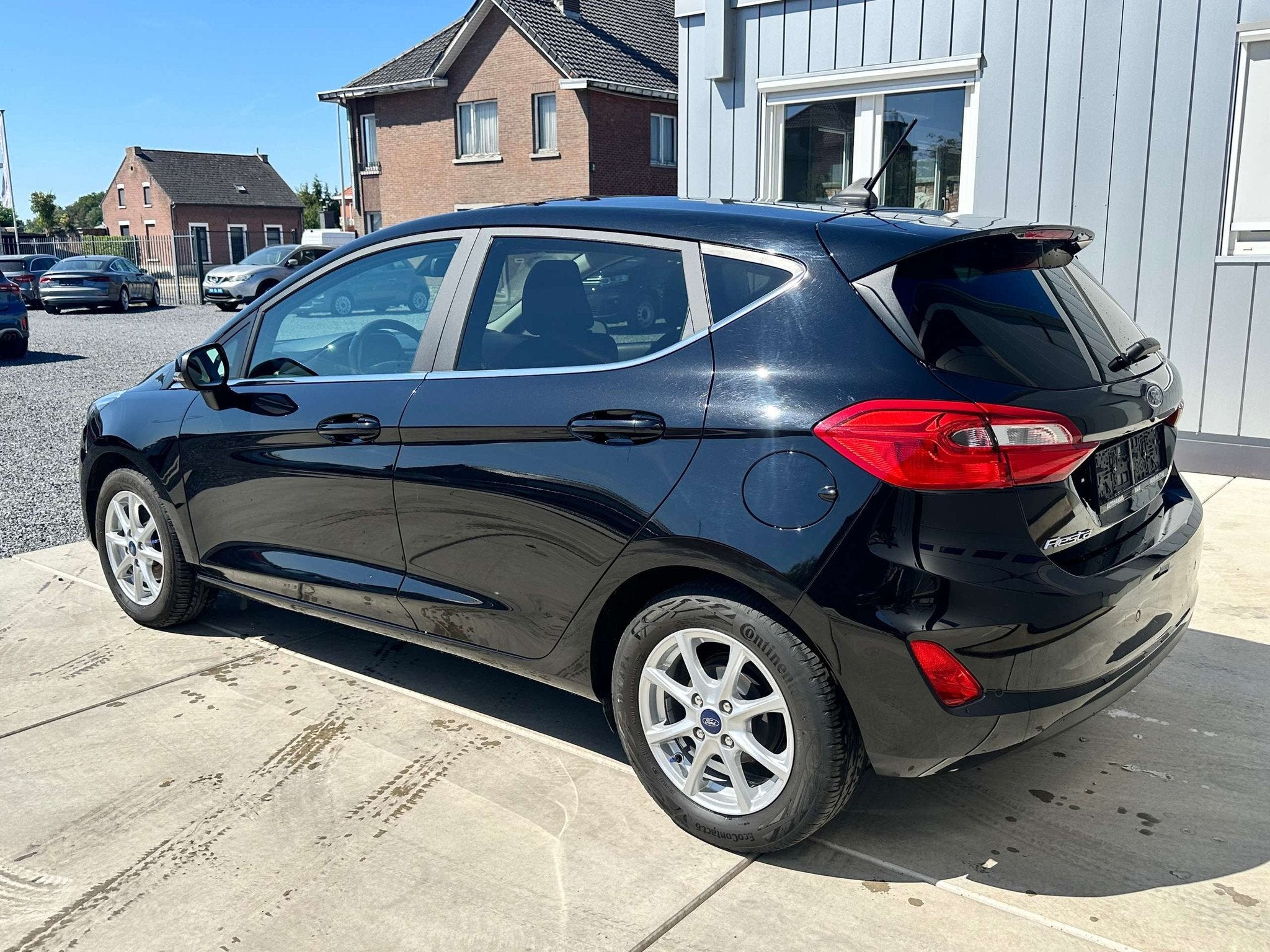 Ford Fiesta Fiesta 1.0 EcoBoost Titanium *12M garantie*, Auto's, Stof, Gebruikt, Zwart, Bedrijf
