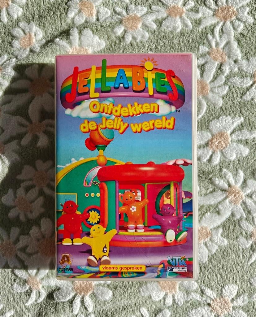 VHS - Jellabies - Ontdekken de jelly wereld - Vlaams - €5, Cd's en Dvd's, Alle leeftijden, Ophalen, Gebruikt, Tekenfilm