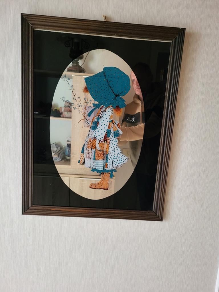 Mooie kader in spiegelglas, Ophalen