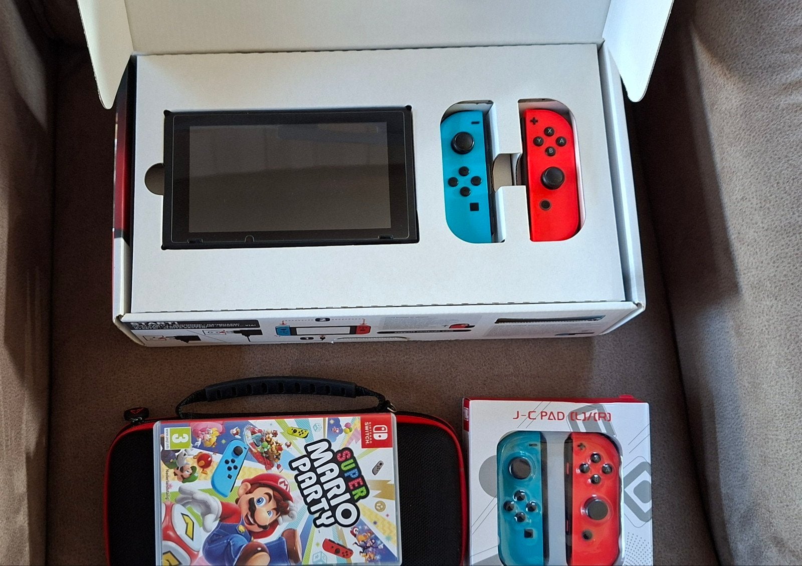 Nintendo Switch V1 + jeu + étui + nouvelles manettes, Enlèvement