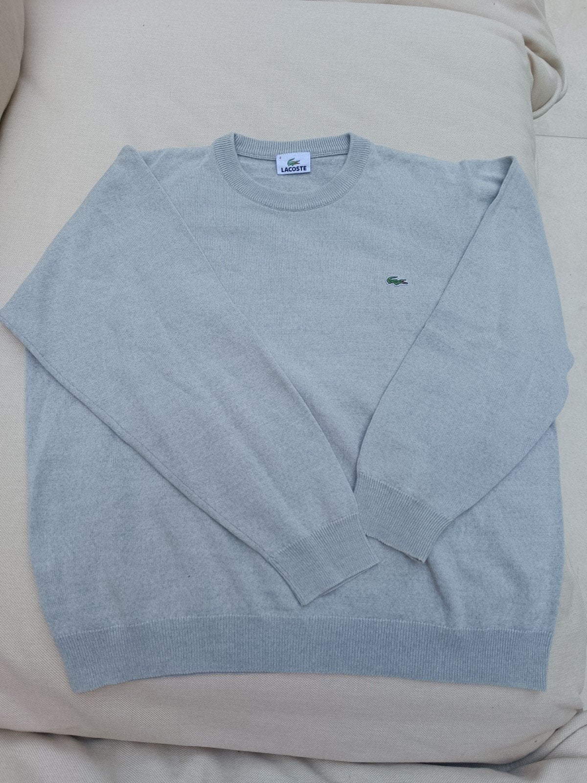 Trui Lacoste medium, Ophalen