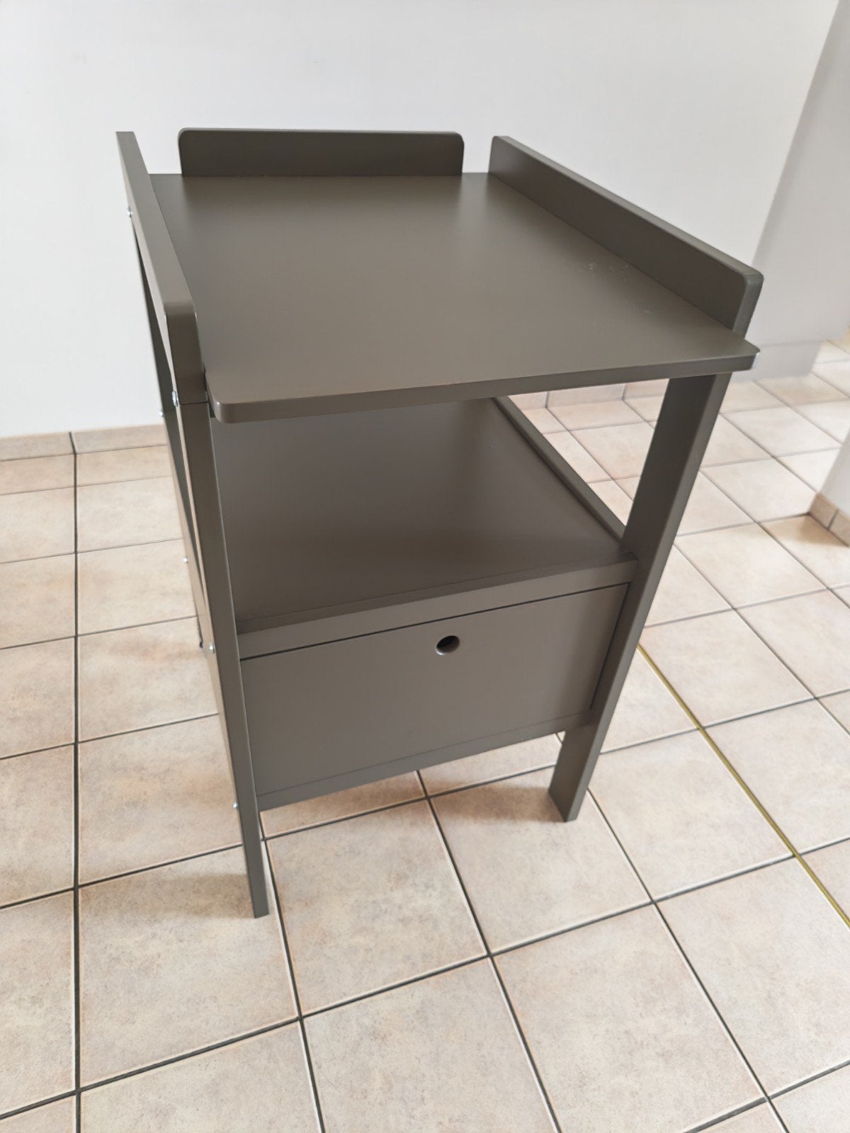 Zeer stevige verschoontafel, Ophalen