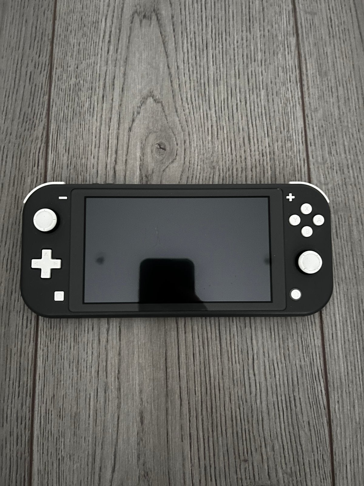 Nintendo Switch Lite Zwart + Oplader, Doos & Hoesje, Games en Spelcomputers, Ophalen, Grijs, Gebruikt, Met beschermhoes of tas