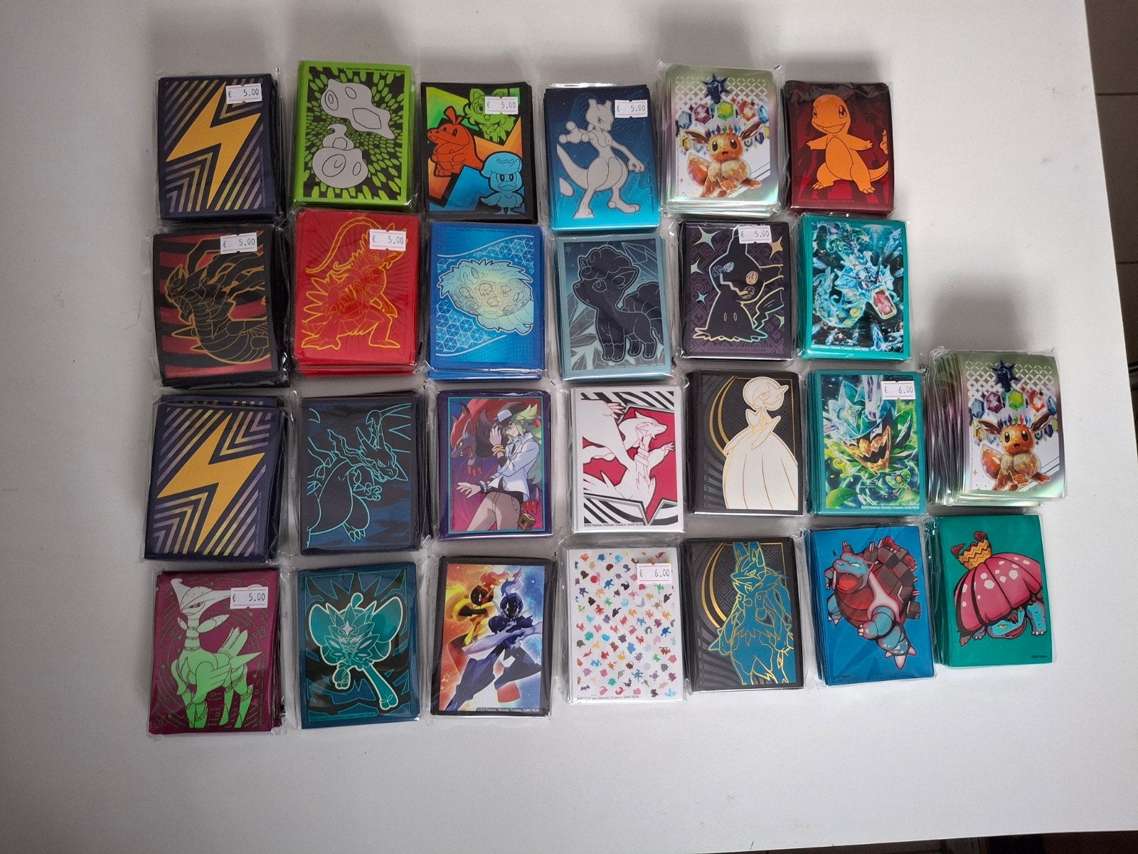 Pochettes Pokémon provenant de nombreux sets., Enlèvement ou Envoi