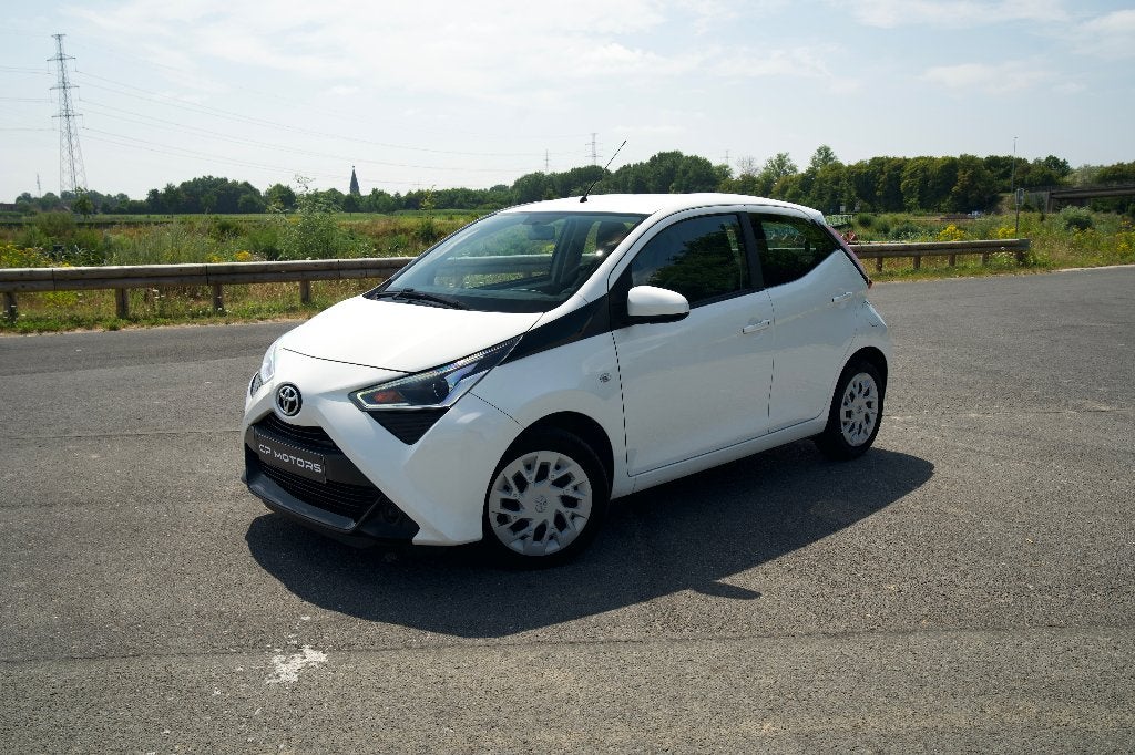 TOYOTA AYGO 1.0i | AUTOMAAT | CAMERA | CARPLAY | 1E EIGENAAR, Auto's, 4 zetels, Stof, https://public.car-pass.be/vhr/df8dbd36-5ece-4b0b-8282-5a07db98df0a?lang=nl
