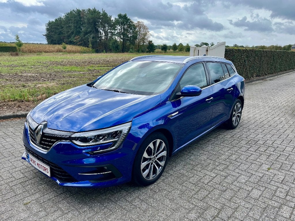 Renault Megane Grandtour 1.3TCe Automaat 2023 Led/Navi/Airco, Auto's, Renault, Dealer onderhouden, 4 cilinders, Blauw, Leder en Stof