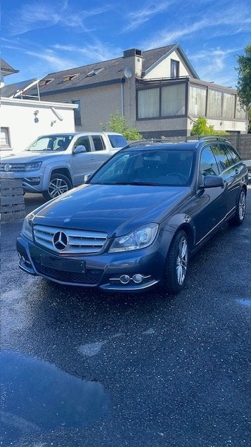 Mercedes C220 CDI Facelift Elegance Euro5 Panoramisch Dak, Auto's, Mercedes-Benz, Euro 5, Stof, Zwart, Blauw