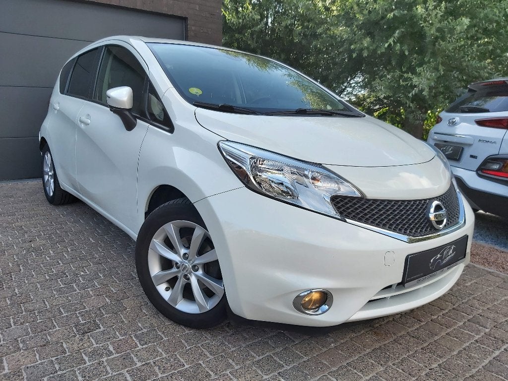 NISSAN Note 1.2i Tekna wit +2 JR GAR*AIRCO*PDC*CAM*GPS*RUIM, Auto's, Voorwielaandrijving, Dealer onderhouden, 4 cilinders, Leder en Stof