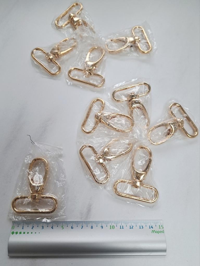 10 musketons goud 35 mm, Ophalen of Verzenden