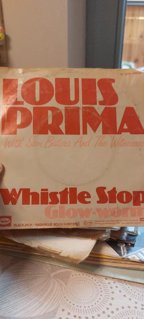 Vinyle 45 tours Louis Prima, Enlèvement