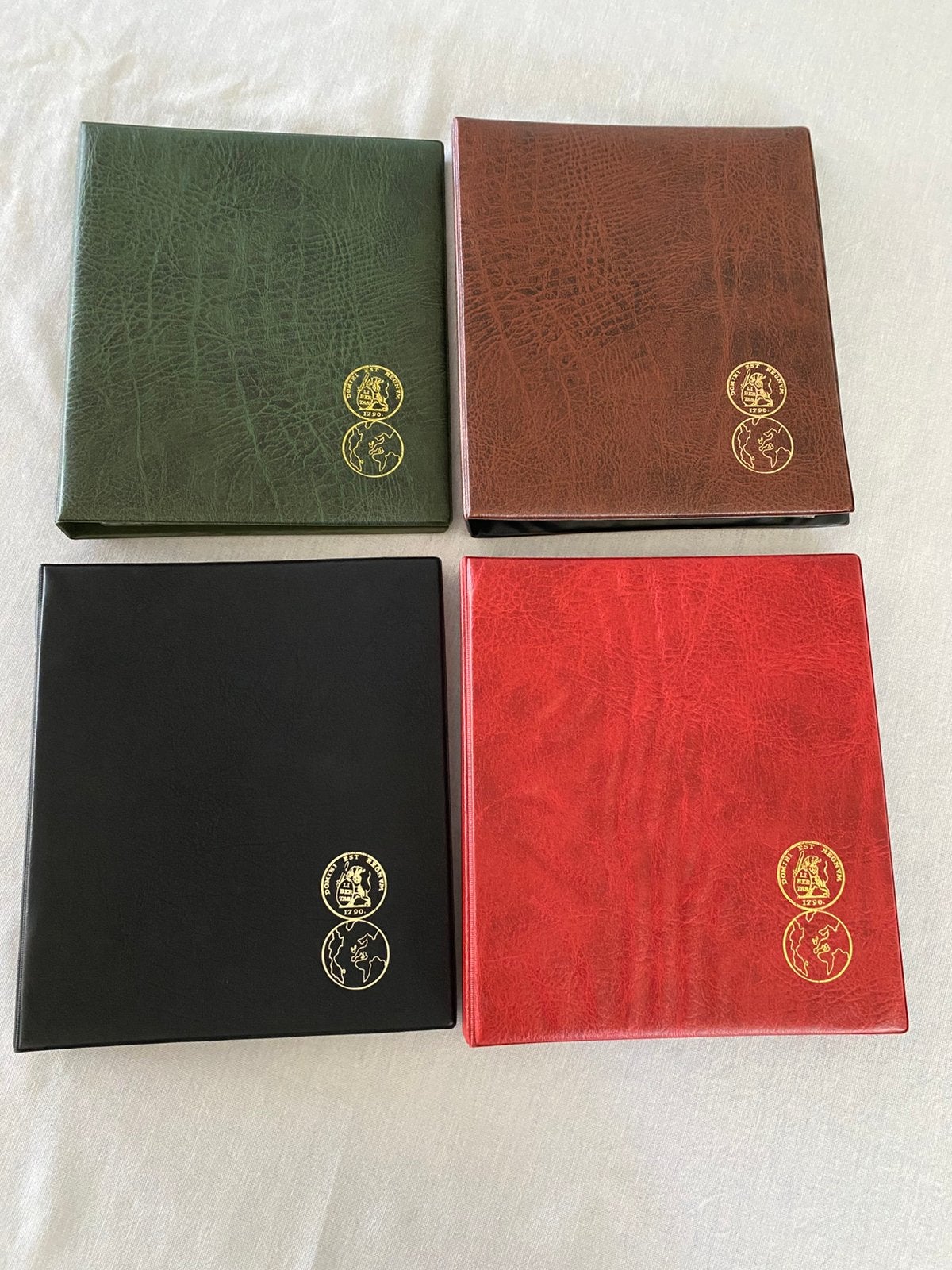 4 Muntenalbums met insteekbladen, Postzegels en Munten, Ophalen of Verzenden, Verzamelmap