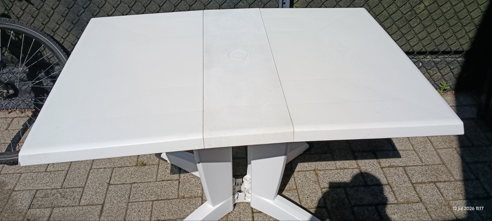 Tuintafel kunstof, Ophalen