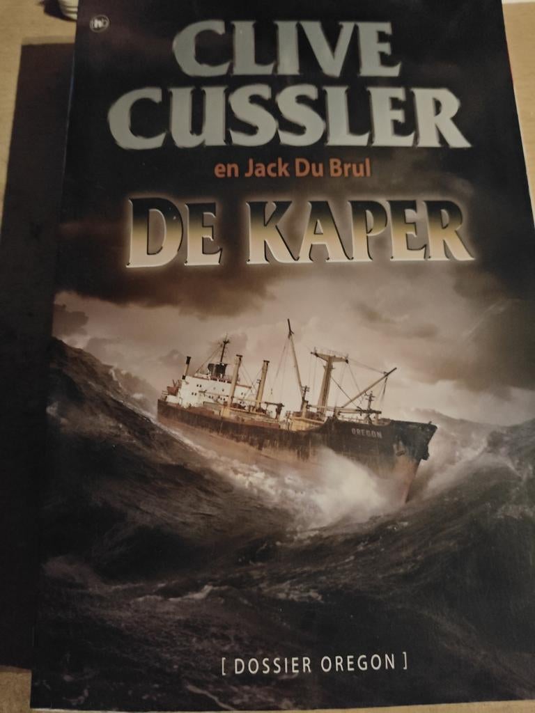 Clive Cussler - De kaper, Ophalen, Zo goed als nieuw, Clive Cussler; Jack Du Brul, Amerika