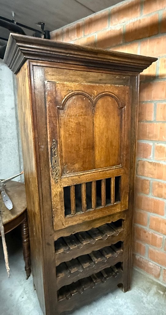 Kast met flessenrek, Ophalen