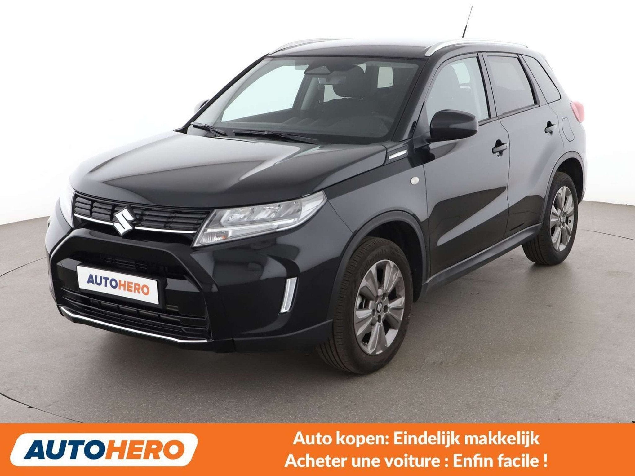 Suzuki Vitara 1.4 BoosterJet Mild-Hybrid Comfort 4x2, Auto's, Suzuki, Stof, Gebruikt, 129 g/km, Zwart