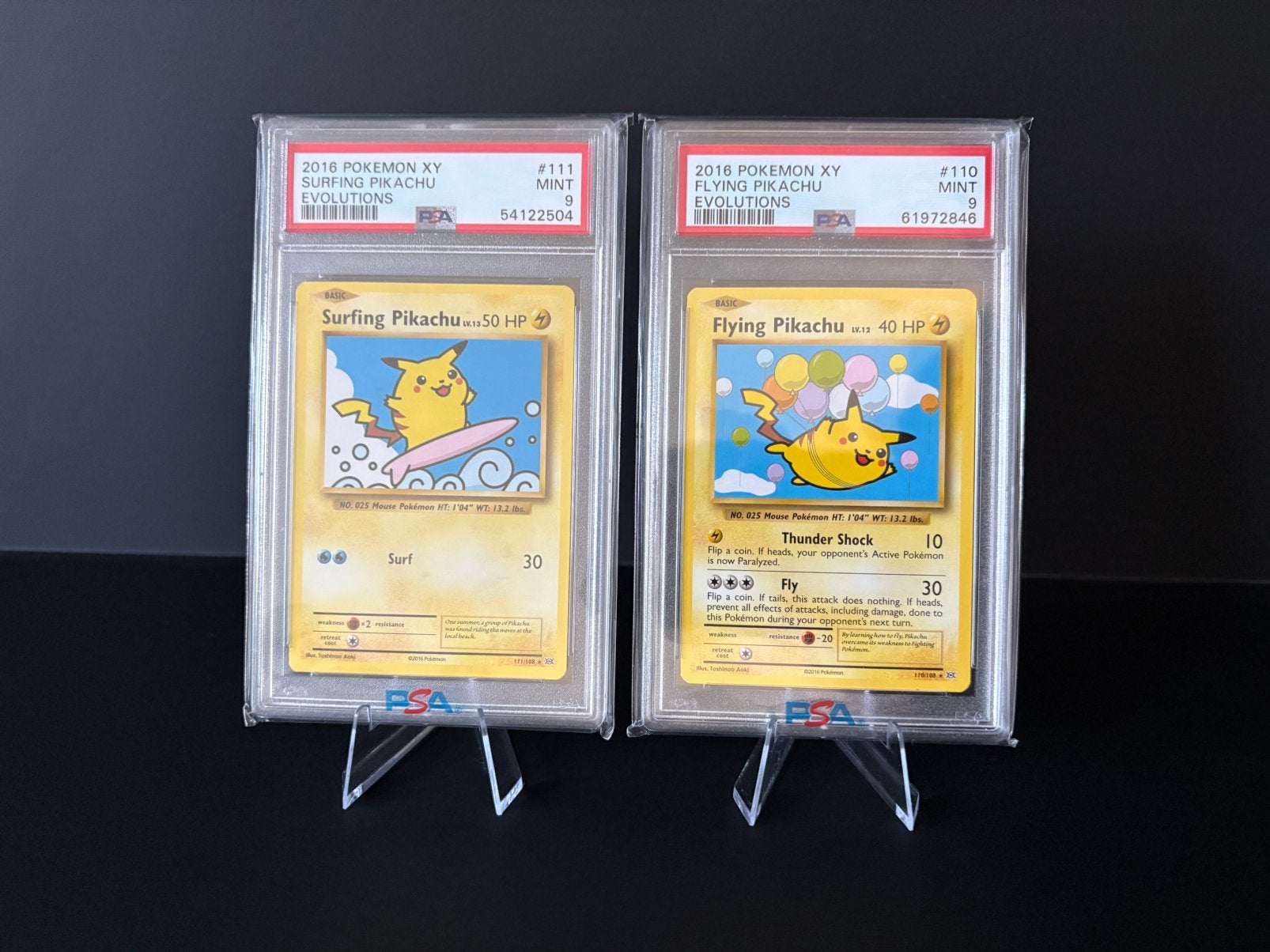 Pokemon Surfing & flying Pikachu psa 9, Ophalen, Zo goed als nieuw