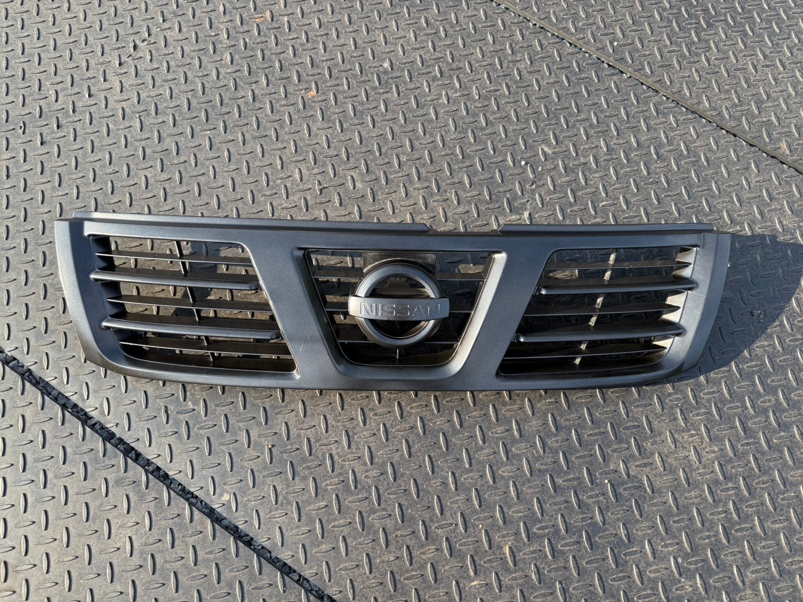 Nissan patrol Y61 grill, Ophalen of Verzenden, Gebruikt, Voor, Nissan