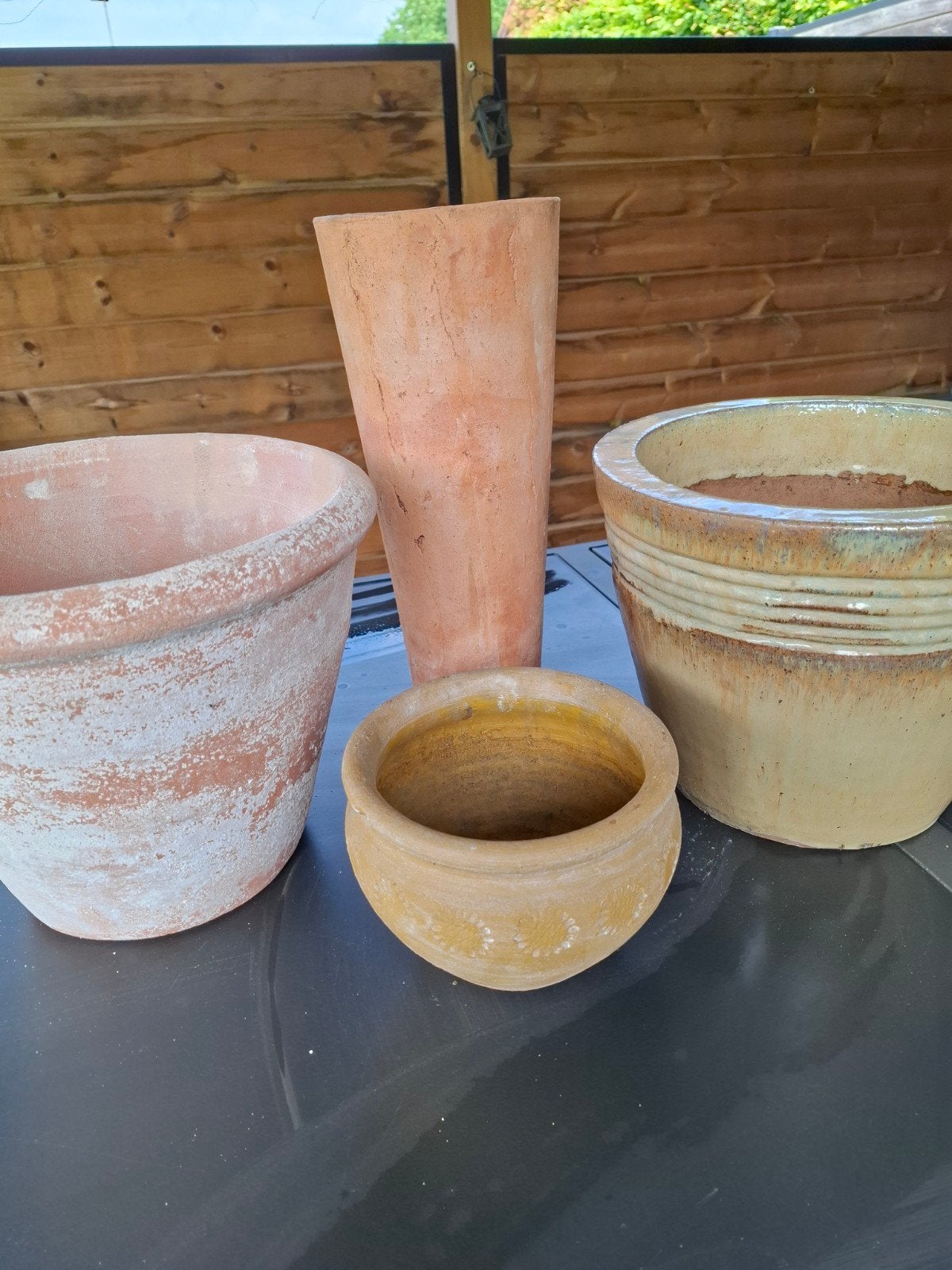 4 terra cotta bloempotten, Ophalen