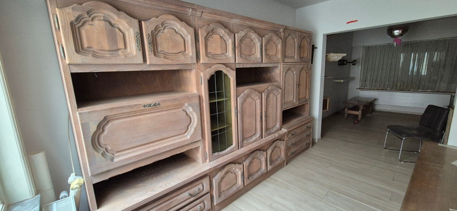 Massief eikenhouten kast, Ophalen