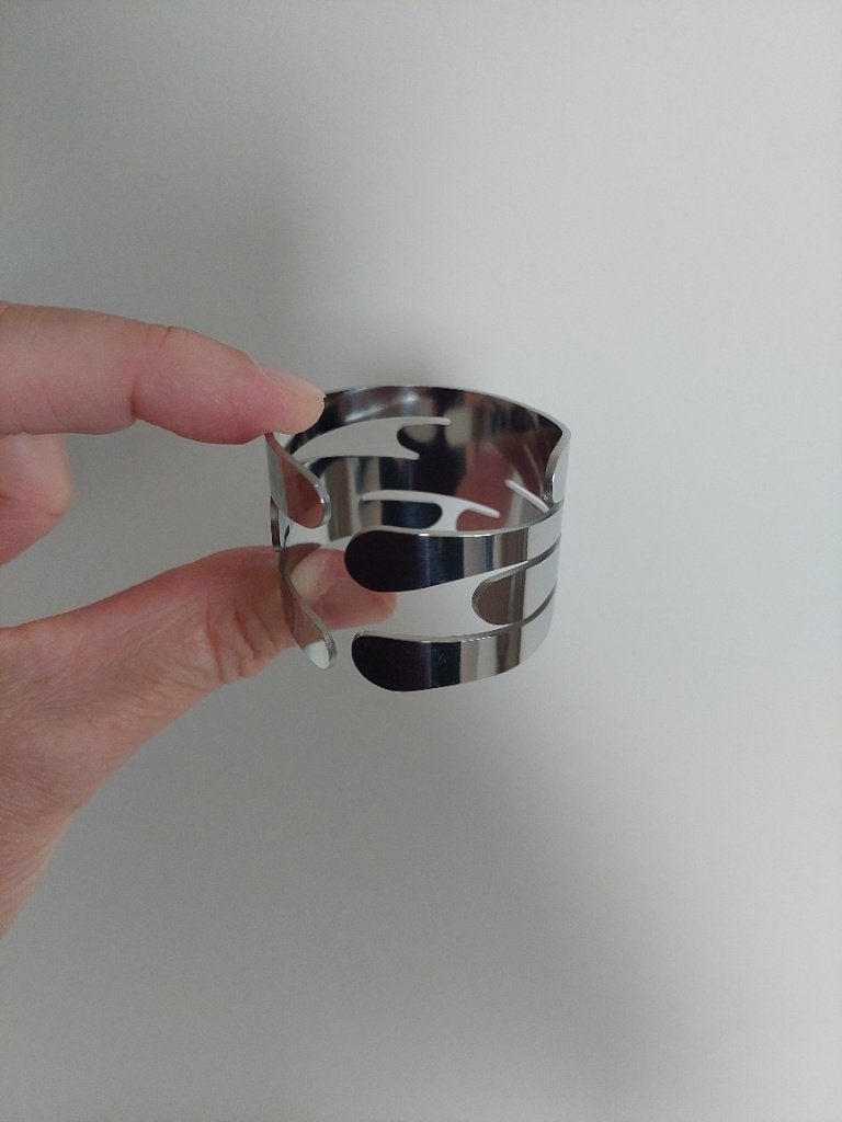 Set van 8 nieuwe servetringen van ALESSI, Huis en Inrichting, Ophalen, Nieuw, Servet