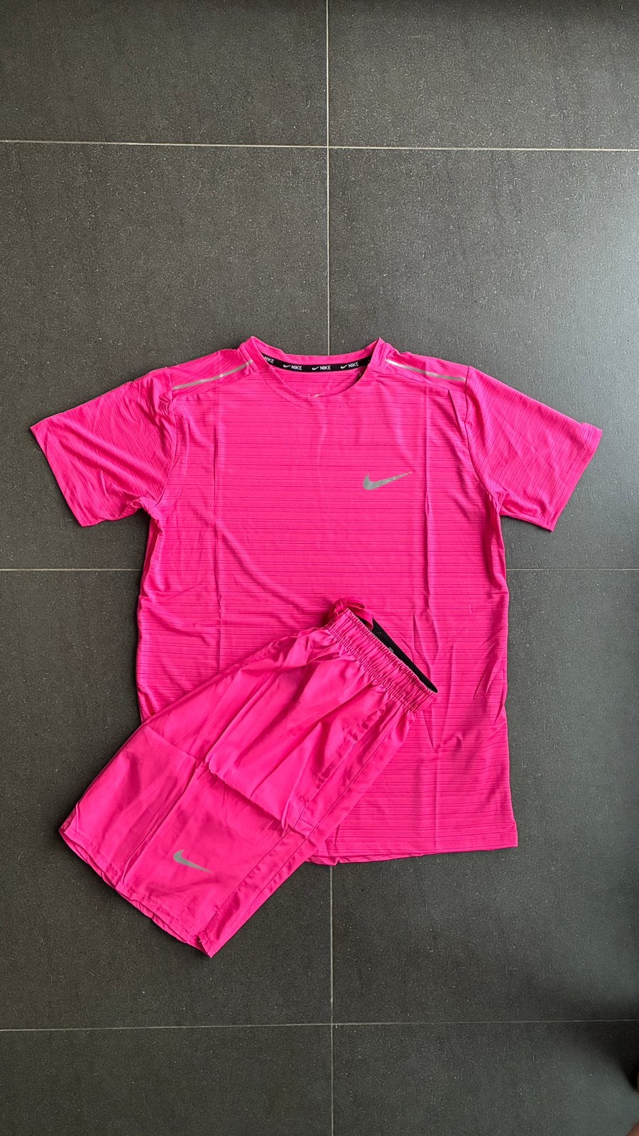 Ensemble running Nike rose, Ophalen of Verzenden, Nieuw, Maat 48/50 (M)