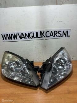 Koplamp set Nissan Primera III ('02-'09), Gebruikt, Ophalen of Verzenden, Nissan, Nissan