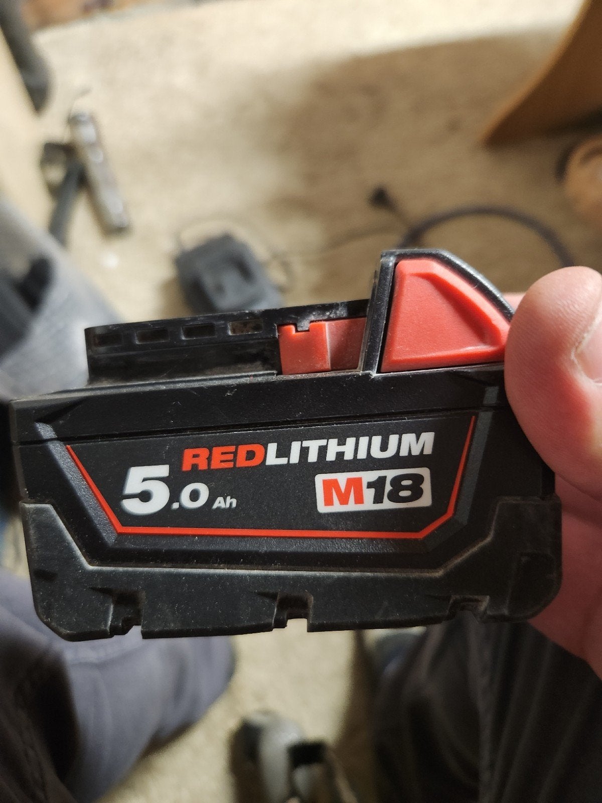 Milwaukee 5.0ah M18 batterij, Ophalen
