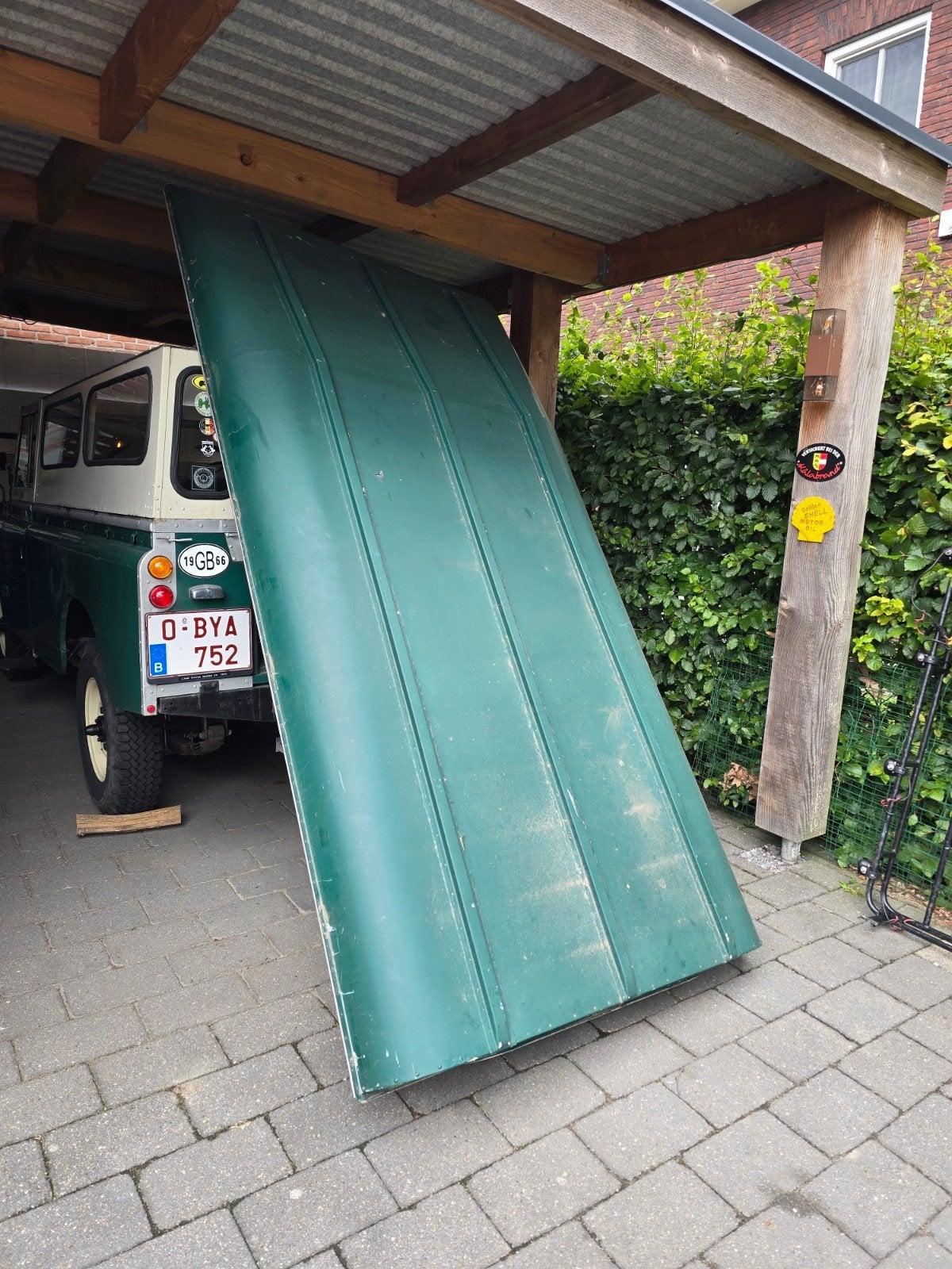 Land Rover 109 plaatwerk en roofrack, Enlèvement