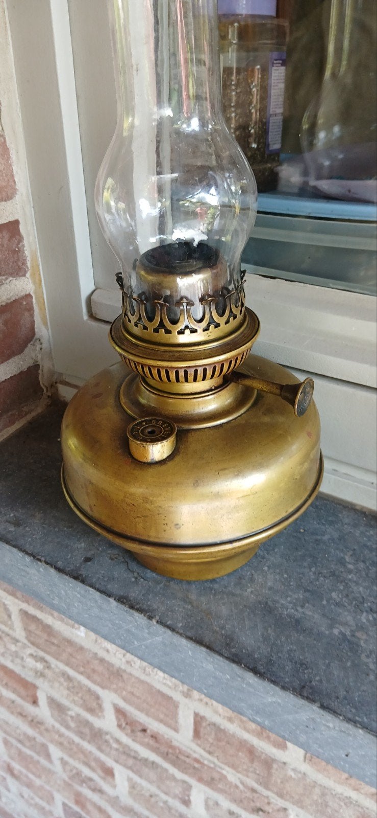 lampe à huile en cuivre, Enlèvement