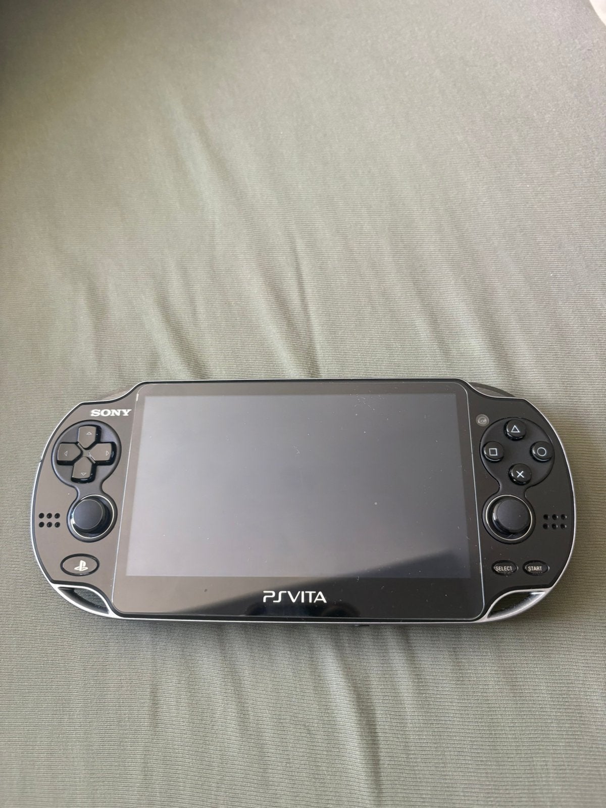 PS Vita, Games en Spelcomputers, Spelcomputers | Sony PlayStation Vita, Ophalen of Verzenden, Zo goed als nieuw, Zwart, Met games