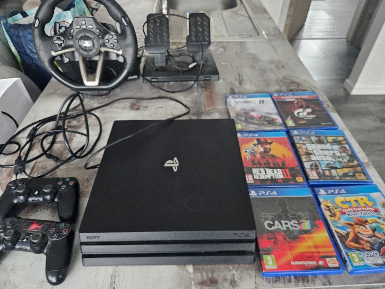 ps4 pro 1to avec 6 jeux , 2 manette et 1 volant, Enlèvement, Pro, Avec jeux