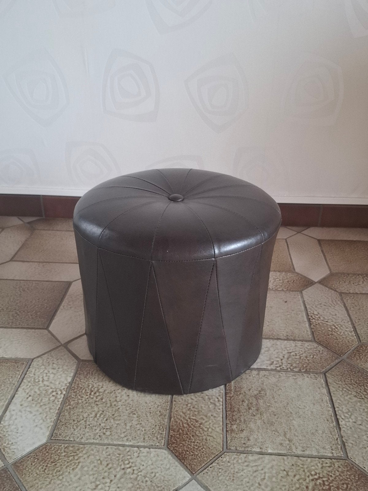 Poef leder bruin, Enlèvement