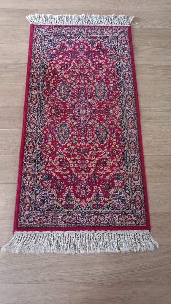 Wollen tapijt 70 x 135, Ophalen
