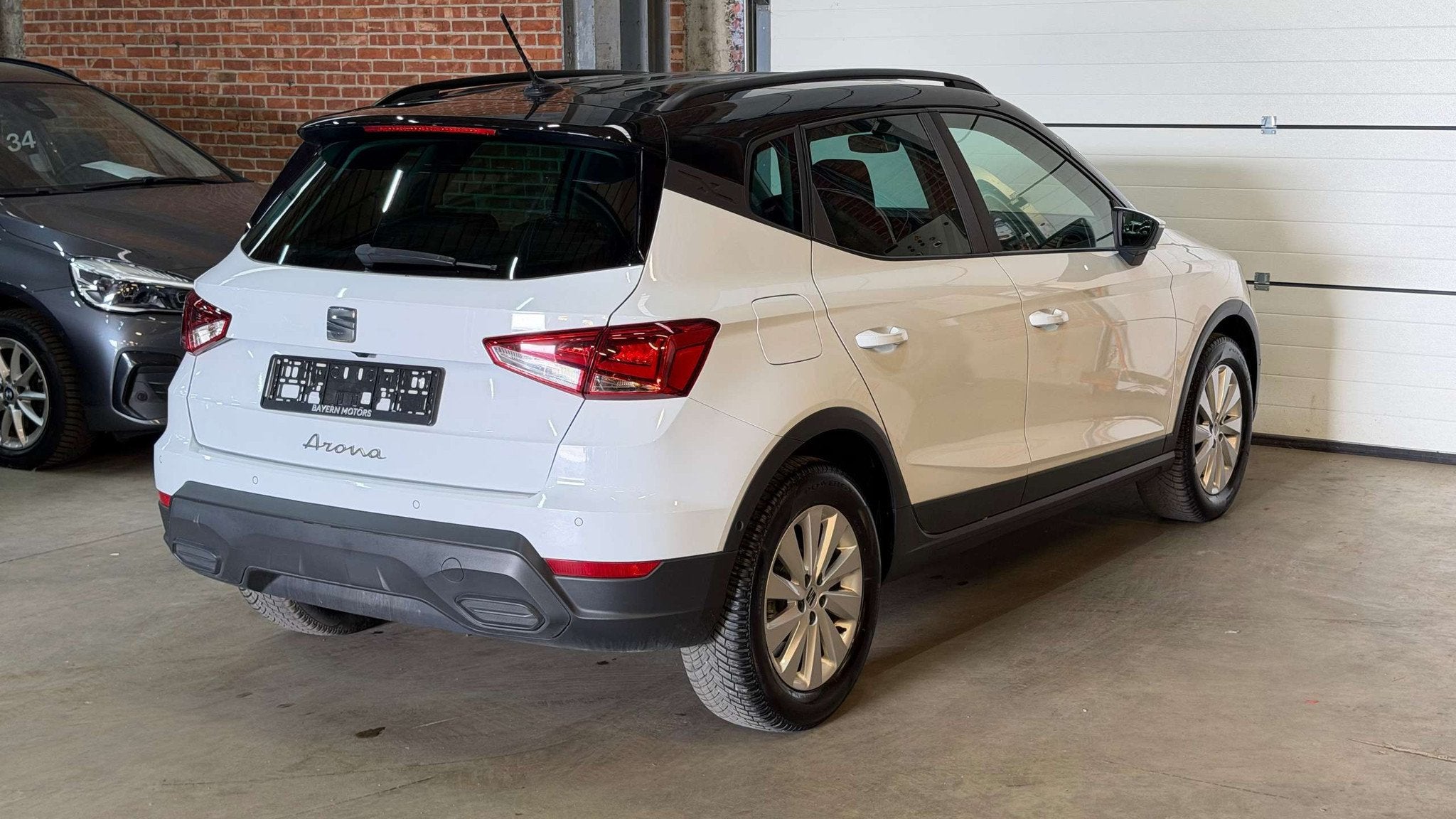 Seat Arona 1.0 TSI Benzine Garantie EURO 6d, Auto's, Seat, Stof, Gebruikt, Wit, Bedrijf