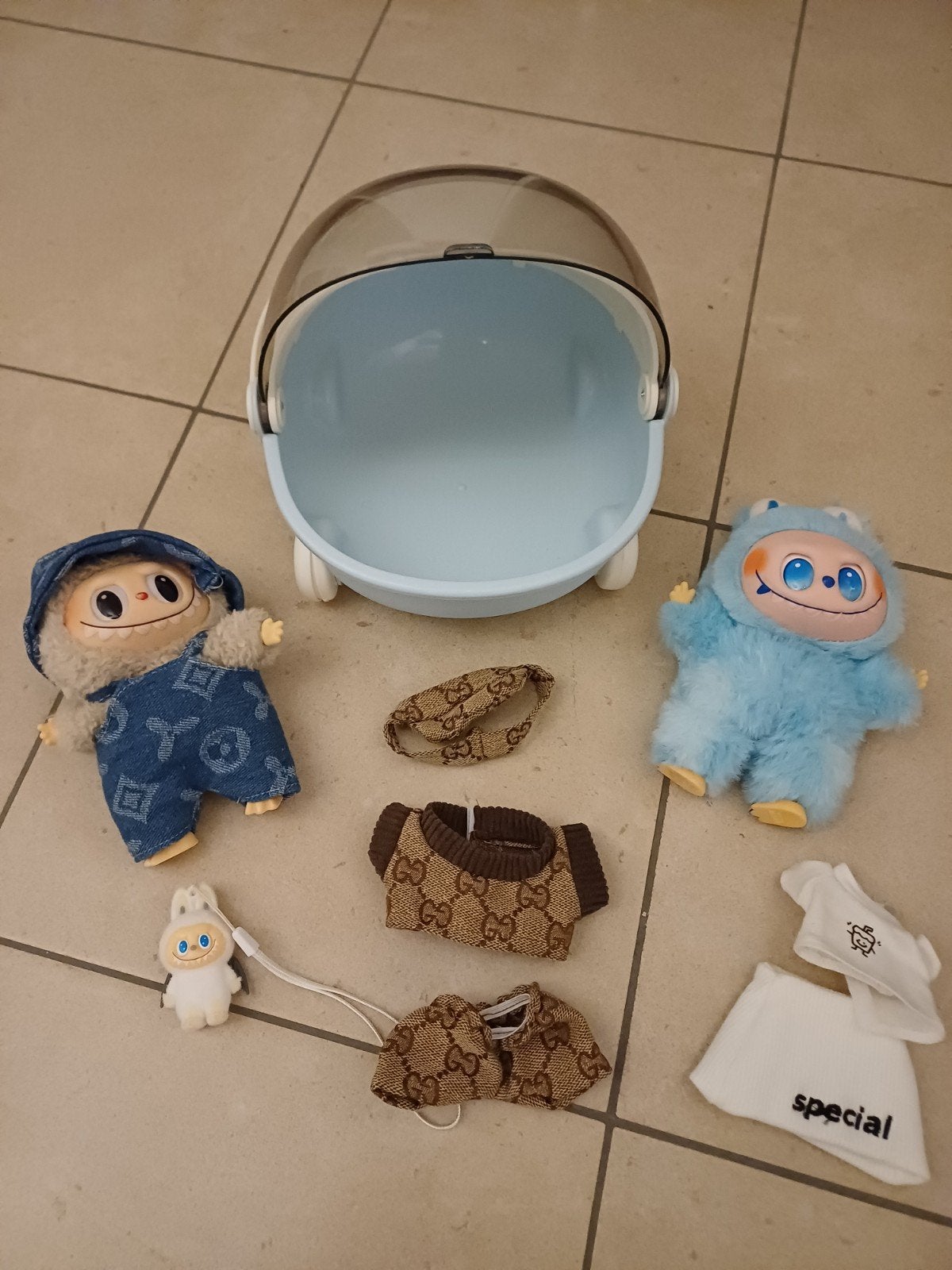 Lafufu met bedje en 3 kledingsets, Ophalen