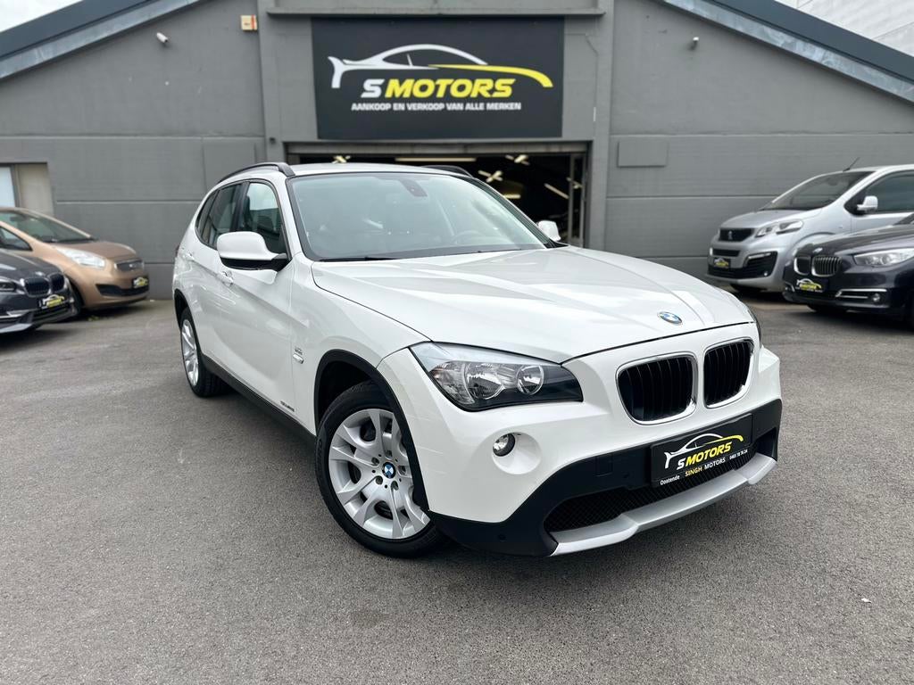 BMW X1 sDrive18i | AUTOMAAT | Cruise | Gps | GARANTIE |, Auto's, Euro 5, 1995 cc, Wit, Leder