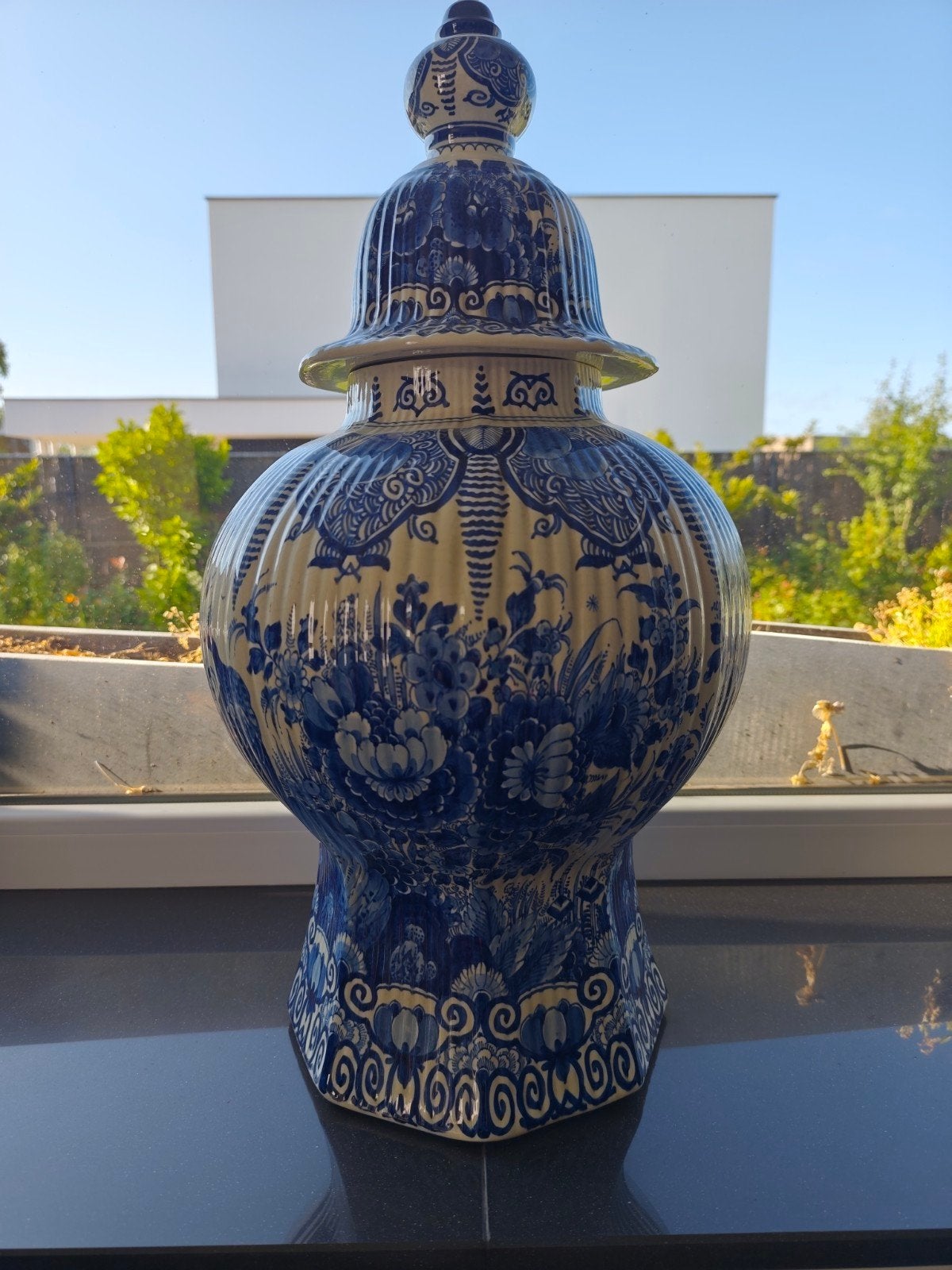Delft vaas., Ophalen