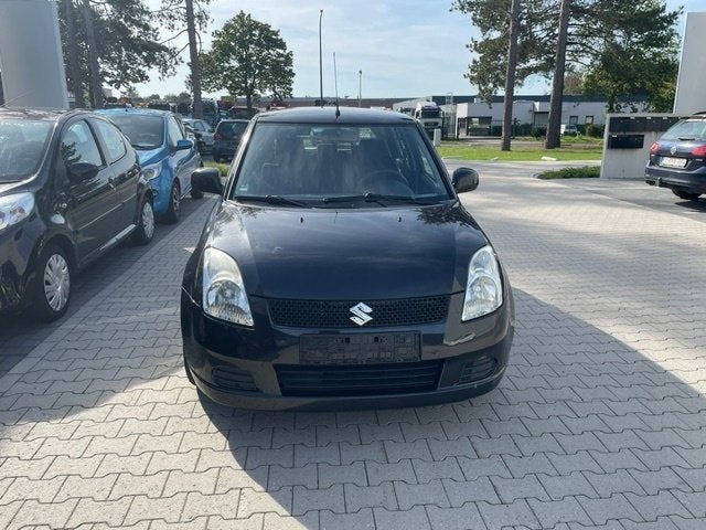 Suzuki Swift 1.3I, Manueel, 4 Deuren, keuring + Garantie, Voorwielaandrijving, Stof, 140 g/km, Zwart