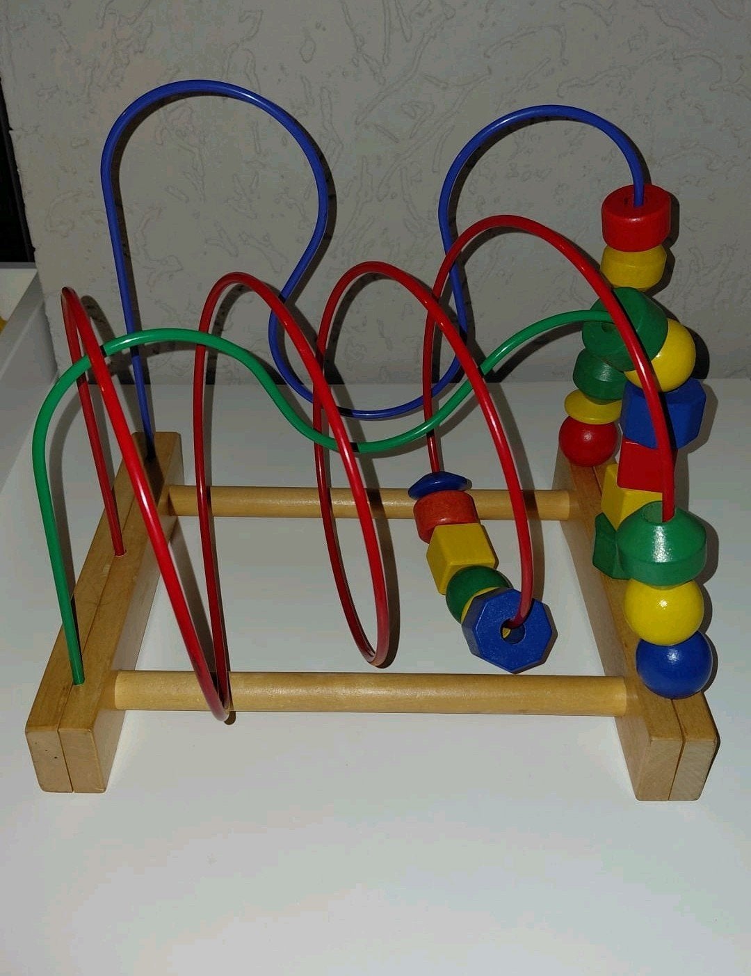 Activiteitenspel kralenframe, Enlèvement