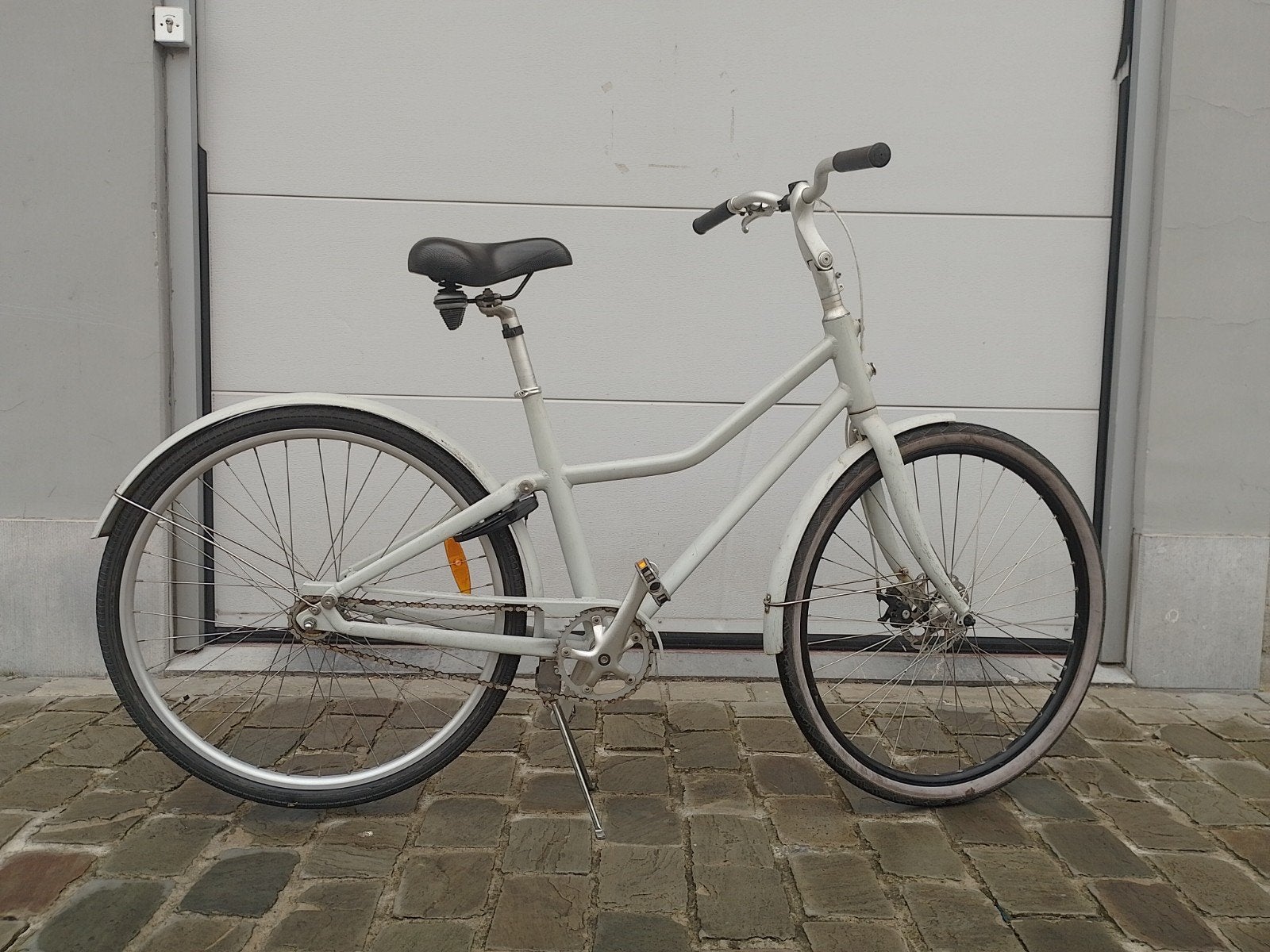 Damesfiets terugtraprem 2 versnellingen ringslot, Ophalen