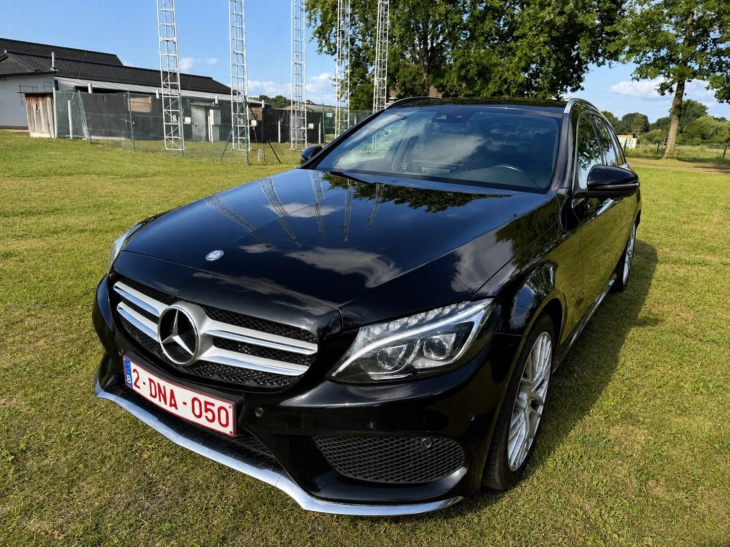 Mercedes-Benz C220d 125 kW AMG line, Zetelverwarming, Achterwielaandrijving, Zwart, Leder