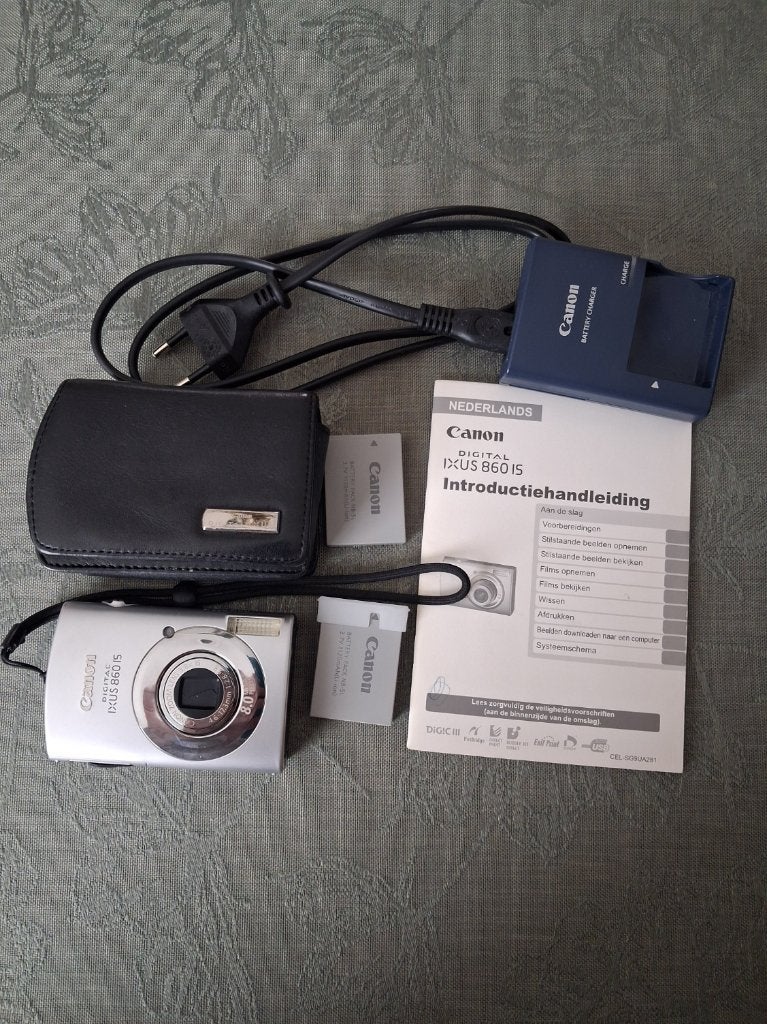 Canon IXUS 860 IS + accessoires., TV, Hi-fi & Vidéo, Appareils photo numériques, Flash intégré, Canon, Batterie, 8 mégapixels