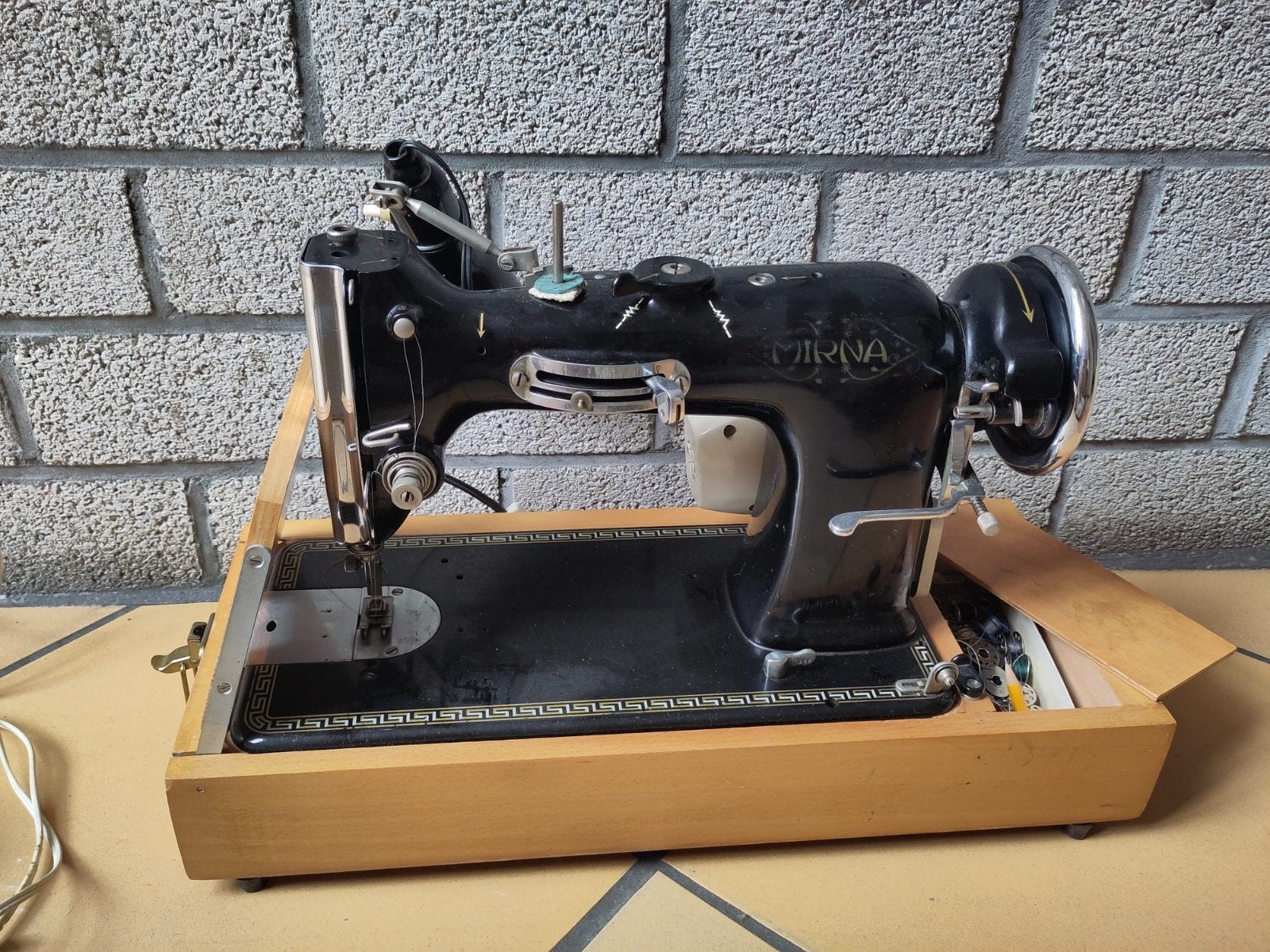 Naaimachine, Ophalen