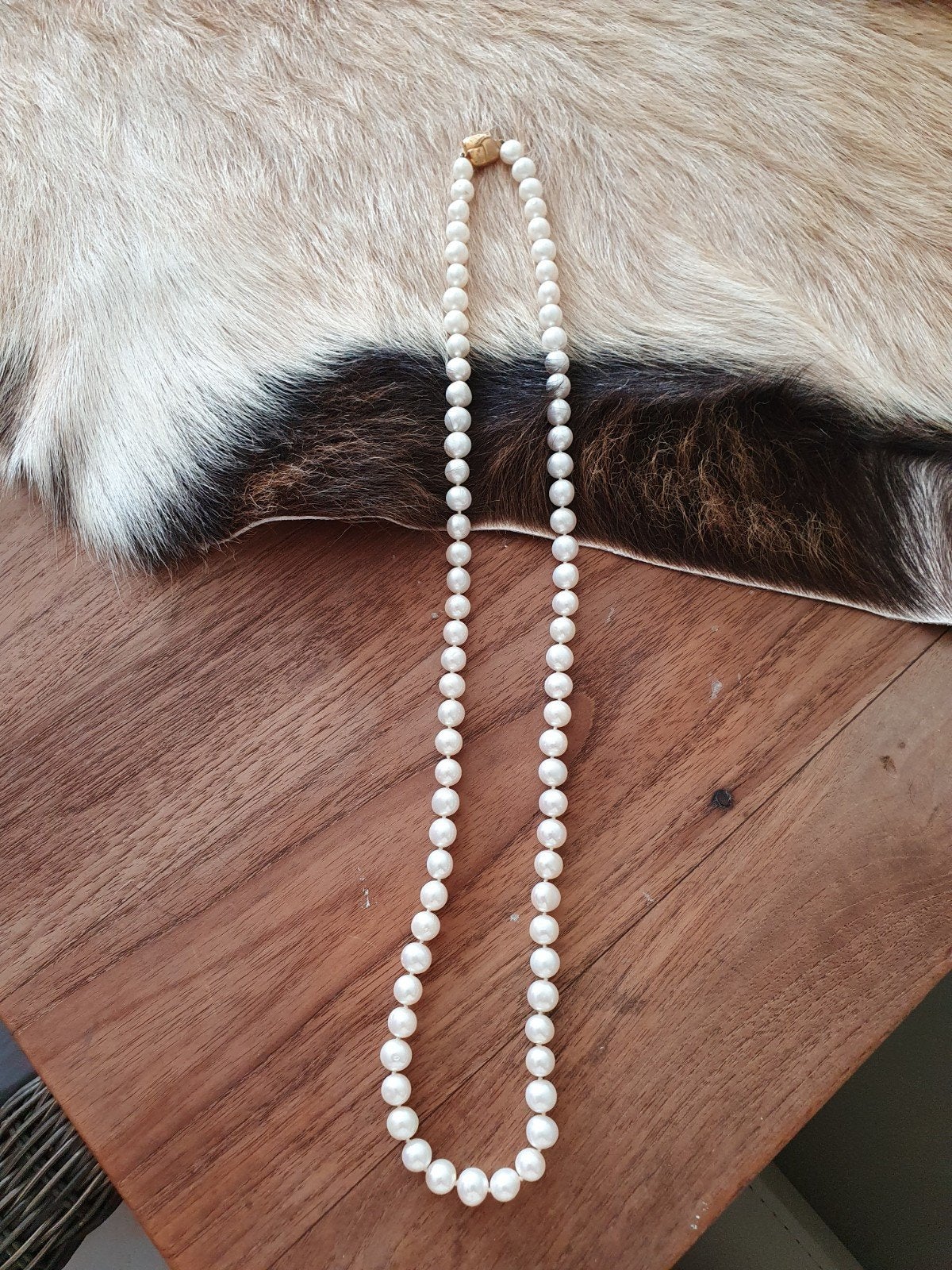 parel ketting, Ophalen