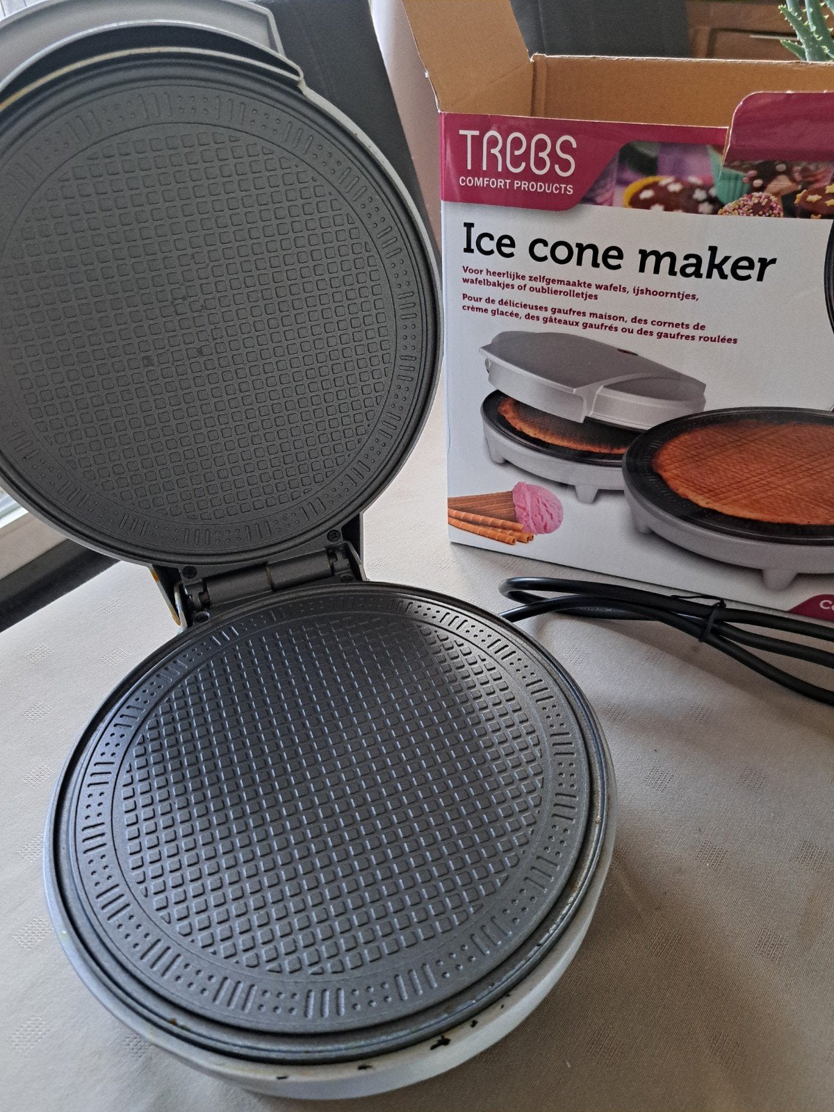 wafelijzer voor koekjes en ijshoorntjes, Ophalen
