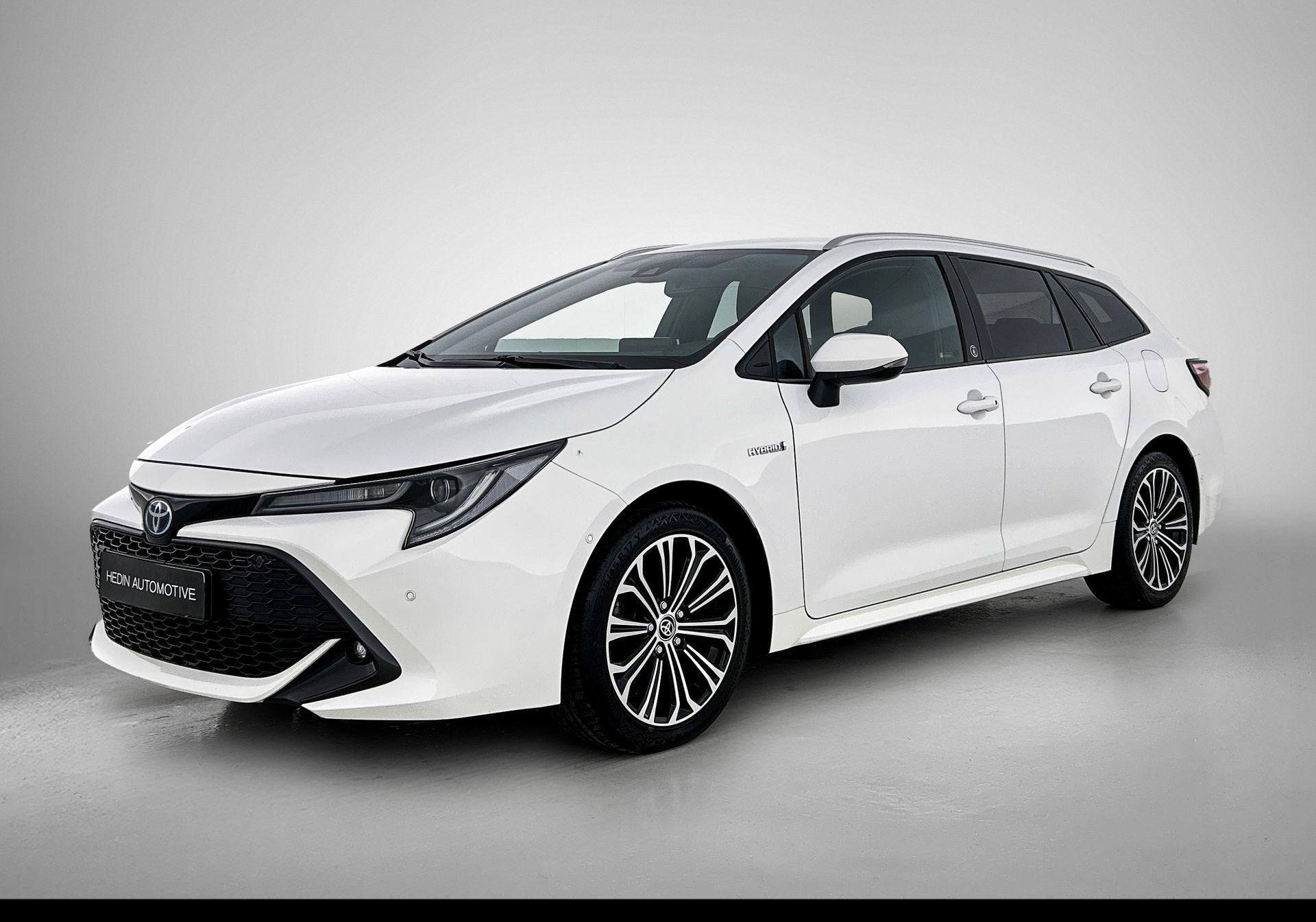 Toyota Corolla Touring Sports 2.0 Hybrid GR Sport e-CVT | Cl, Auto's, Dealer onderhouden, 750 kg, 4 cilinders, Wit