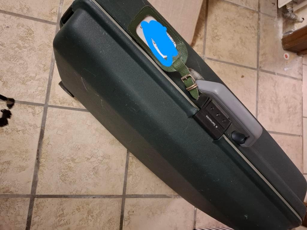 Koffer samsonite, Ophalen